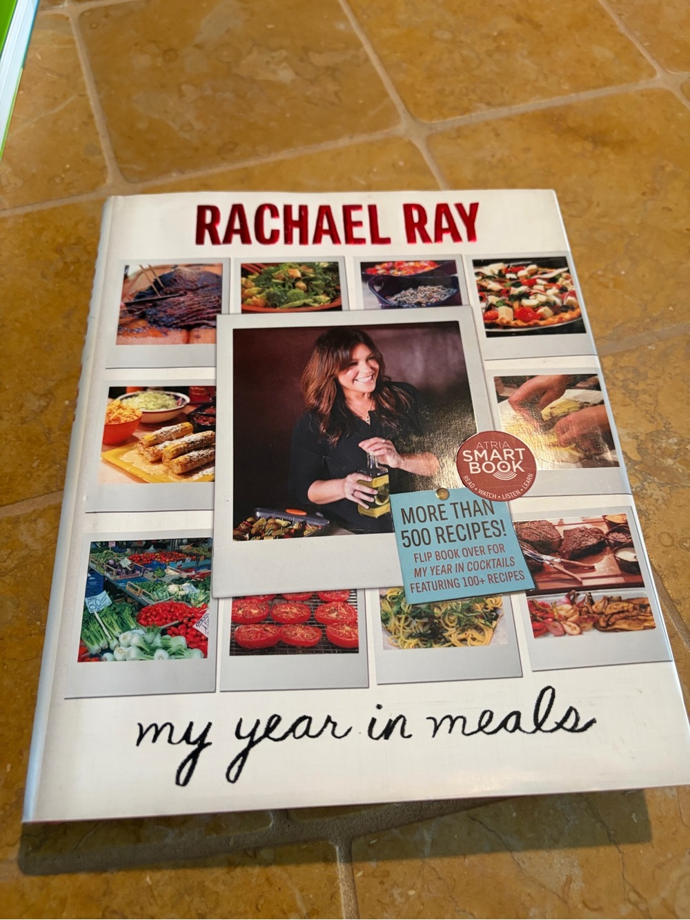 Rachael Ray Cookbook — White Cover with Red Title and Multicolor Food Photos